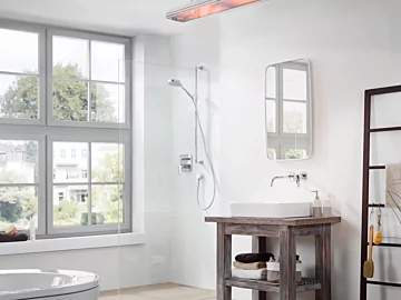 Heatscope Vision 3200W Radiant Heater brings sleek electric heating to a private residential bathroom with minimalist white ceramic glass for energy-efficient warmth.