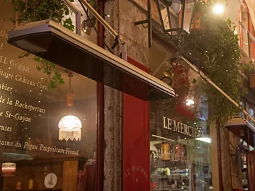 Heatscope Heaters Vision 3200W Radiant Heater wall‑mounted outdoors on a restaurant terrace, electric infrared warmth.