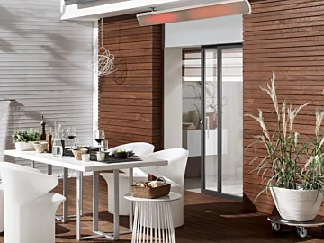 Heatscope Heaters Vision 3200W Radiant Heater wall-mounted on a private residence patio, outdoor electric infrared warmth.